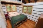 Full bed below, with lofted twin bed above 